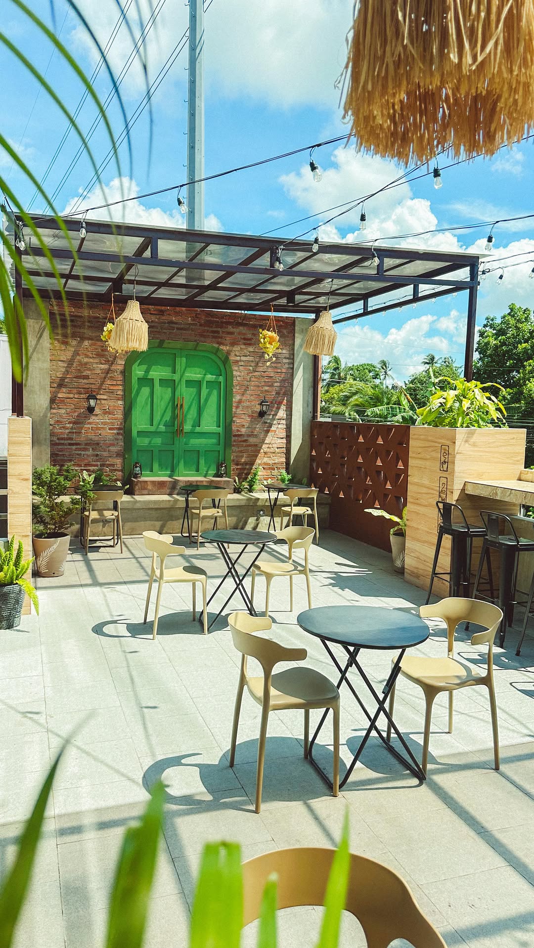 Alfresco outdoor seating area at March&bull;May Caf&eacute; showing open terrace with natural light